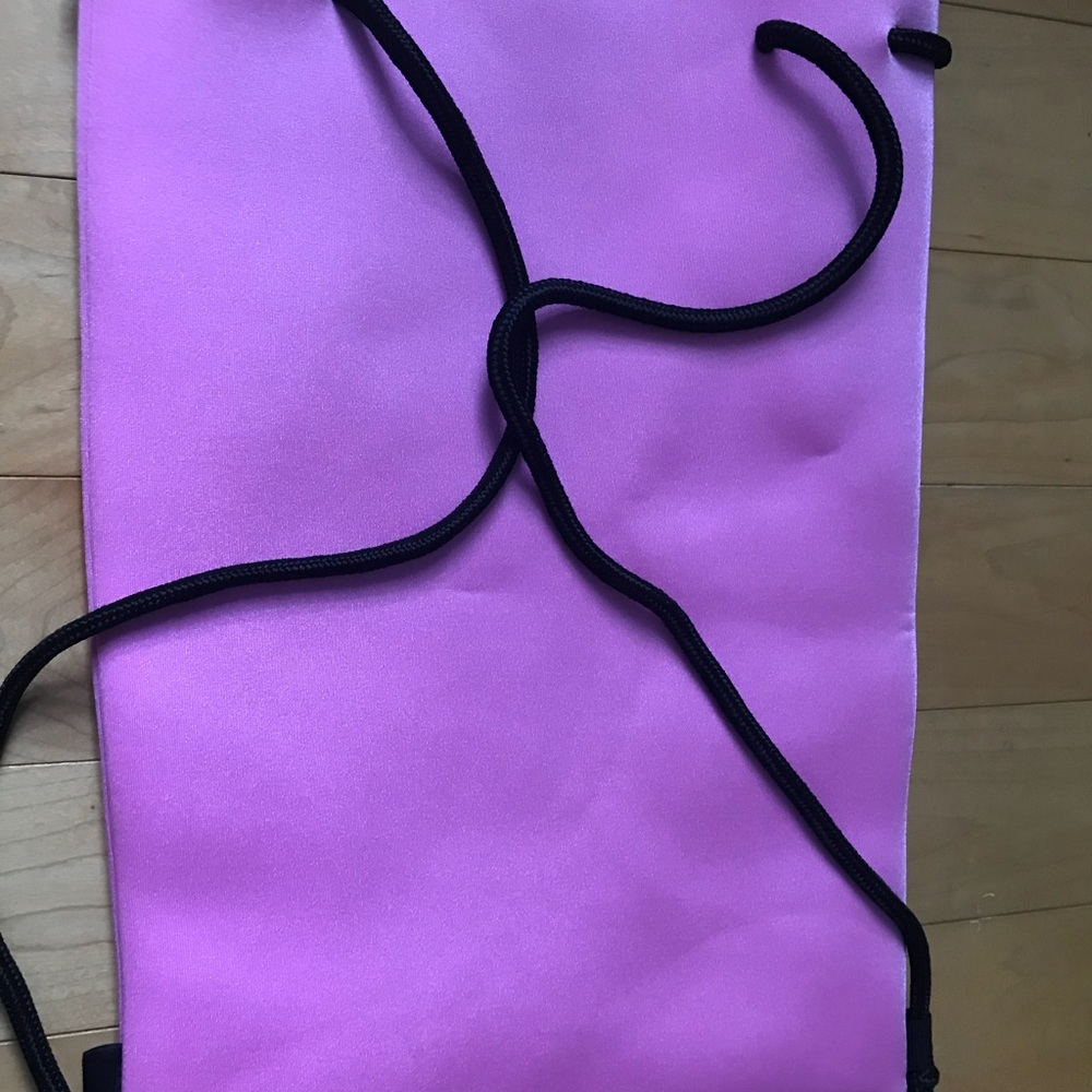 Authentic triangl bag.